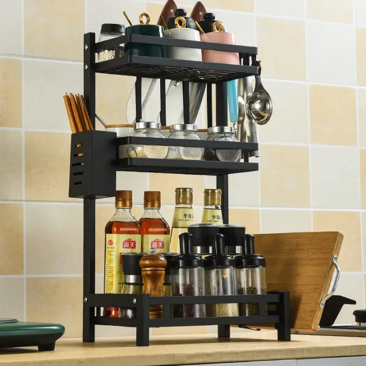Étagère de rangement cuisine multifonction en métal noir. Design compact, grande capacité et robustesse. Idéale pour organiser ustensiles, épices et accessoires.