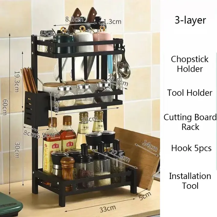 Étagère de rangement cuisine multifonction en métal noir. Design compact, grande capacité et robustesse. Idéale pour organiser ustensiles, épices et accessoires.